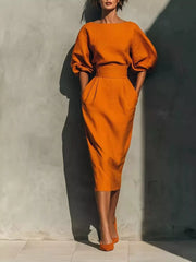 midi dress in orange featuring pocketed and fitted fit