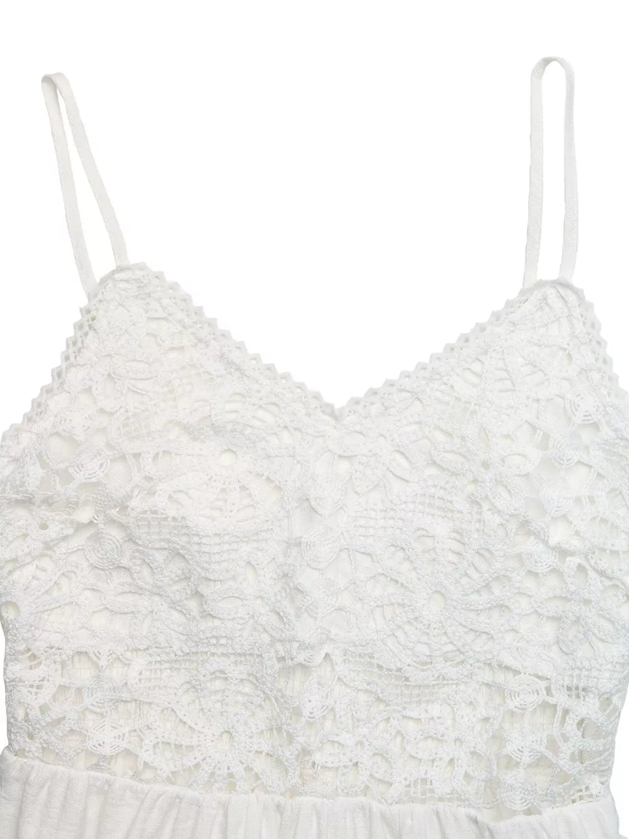 White lace V-neck maxi dress with spaghetti straps and cutout detail.