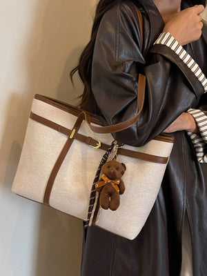 tote featuring geometric in cream with PU Leather Imported Size &amp texture