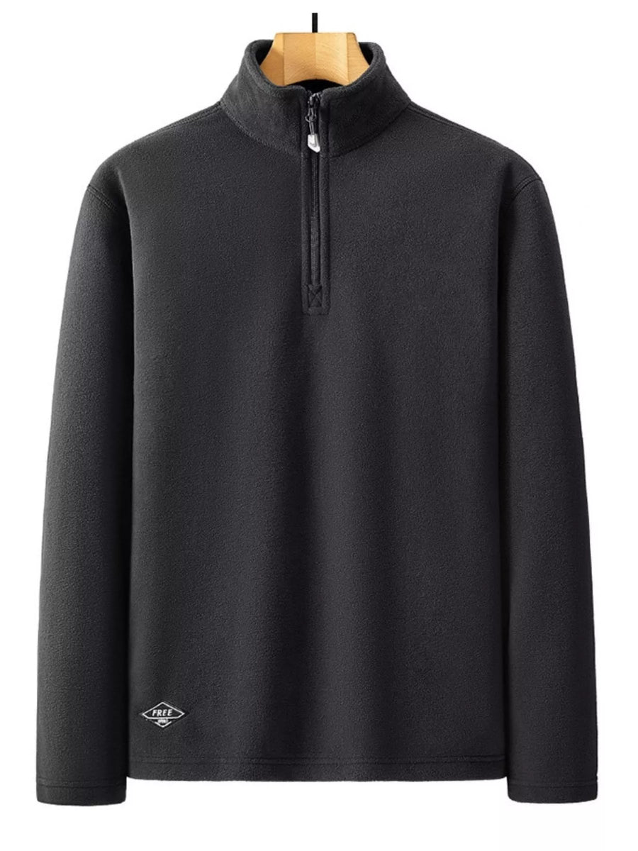Men's black fleece quarter zip sweatshirt with mock neck and embroidered logo detail.