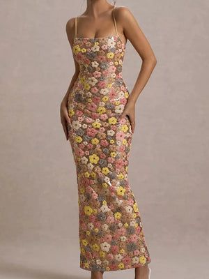 Floral sequin maxi dress with spaghetti straps and a bodycon fit.