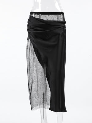 Black midi skirt with asymmetrical sheer lace panel and ruched satin overlay.