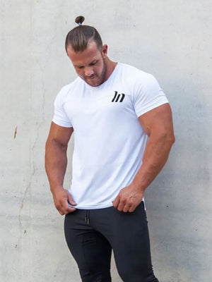 White performance fit raglan tee with black logo detail.