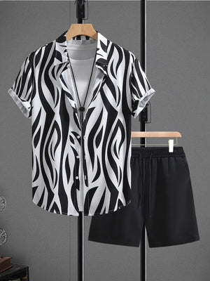Black and white zebra print short sleeve button-up shirt with black drawstring shorts.
