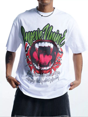 White 100% cotton oversized t-shirt with a bold graphic of fangs and lips.