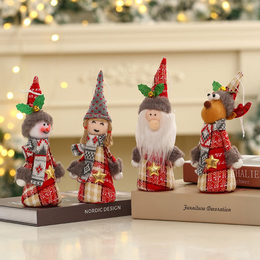 Festive fabric doll ornaments: snowman, girl, Santa, reindeer in red plaid outfits with scarves.
