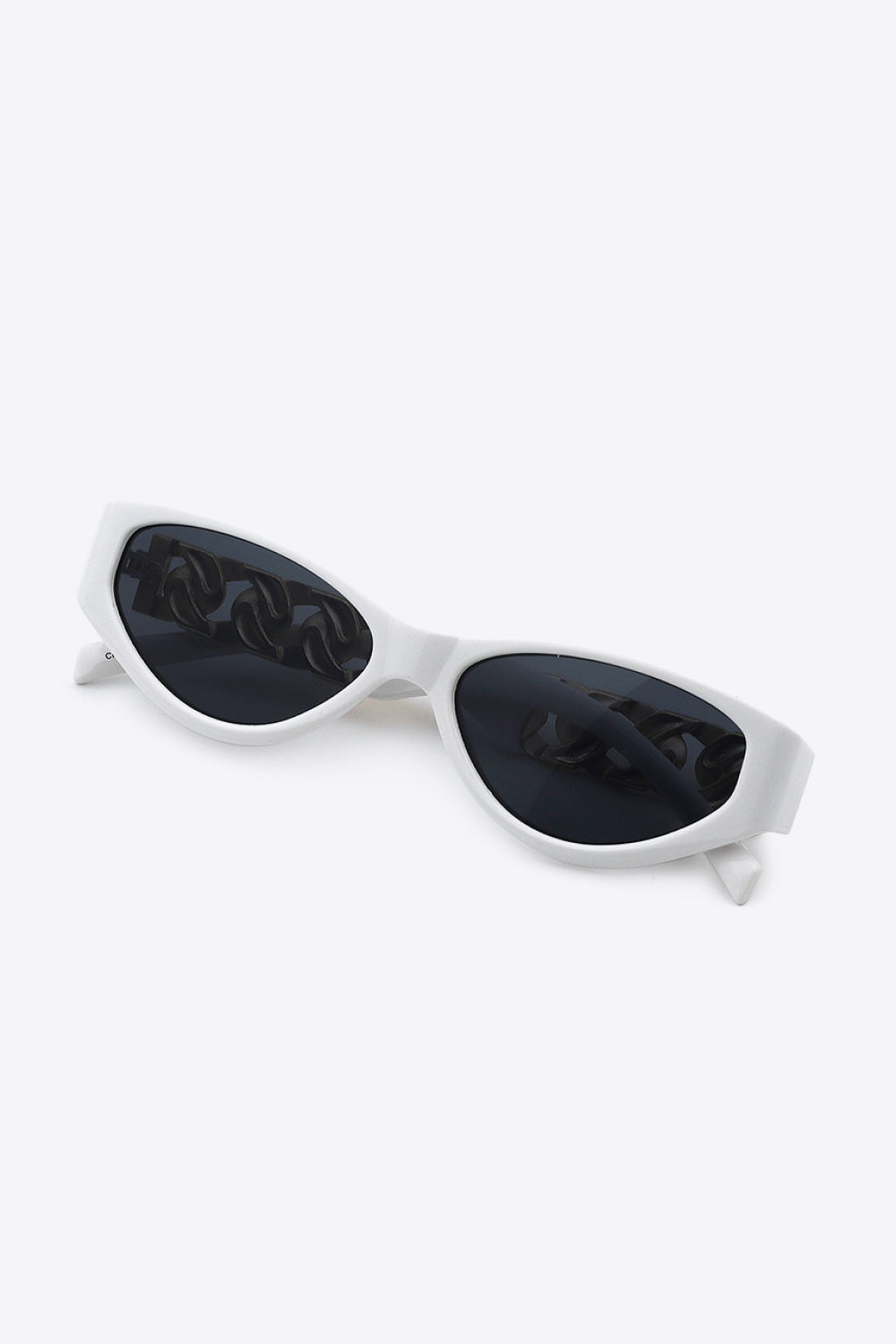 White cat-eye sunglasses with chain detail on lenses