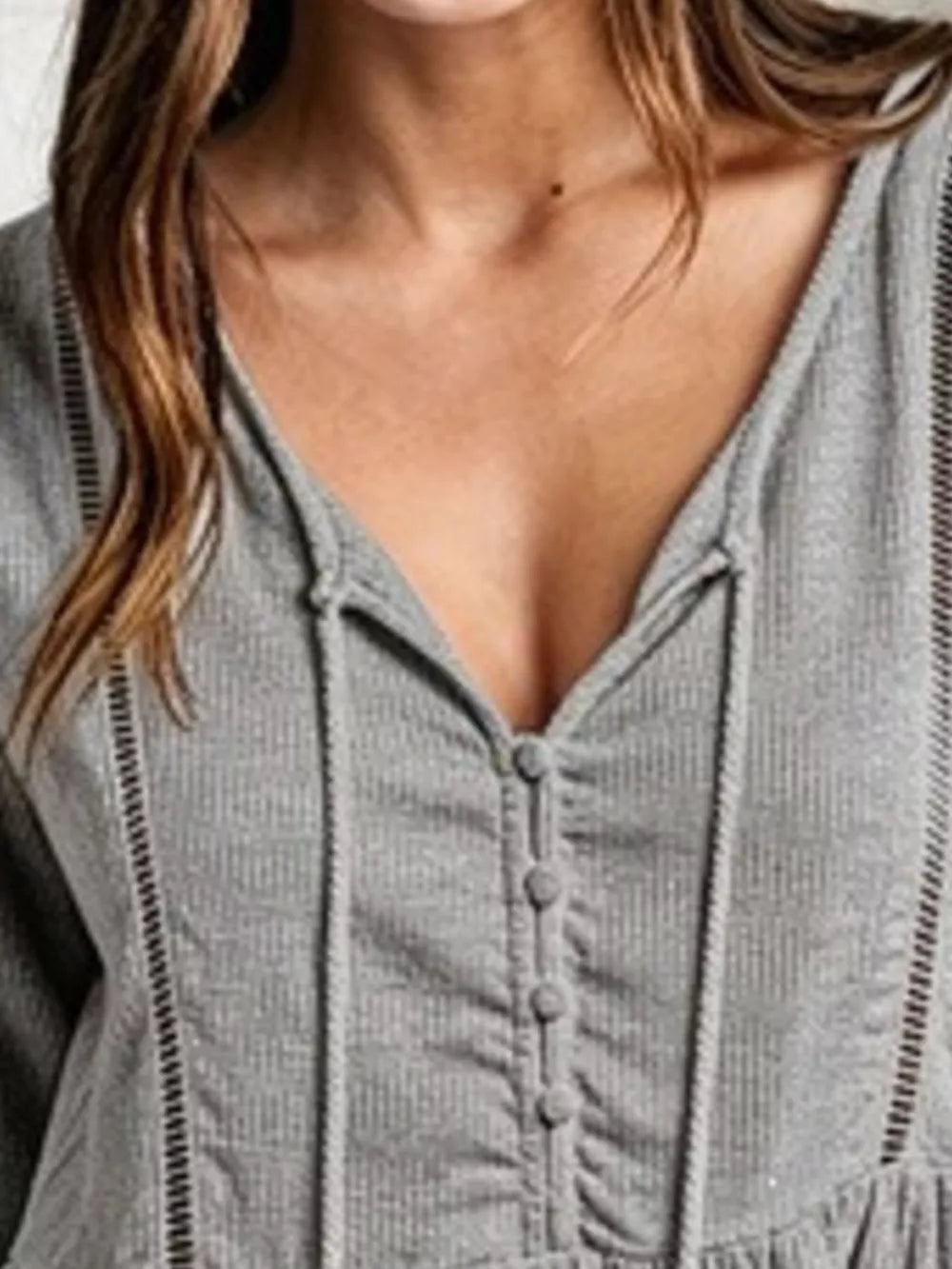 100% polyester Care instructions: Machine wash cold peplum top in Gray with peplum silhouette