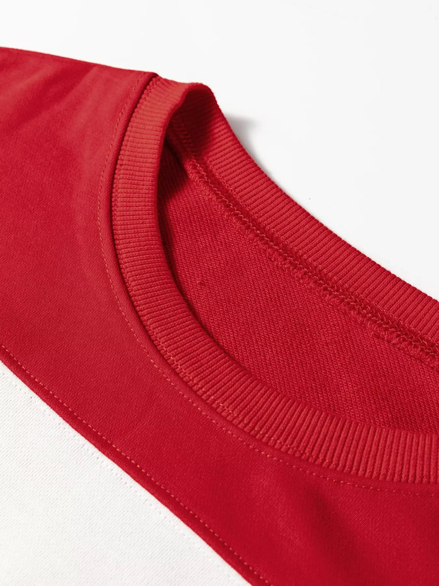Scarlet drop shoulder sweatshirt with crewneck detail and ribbed trim.