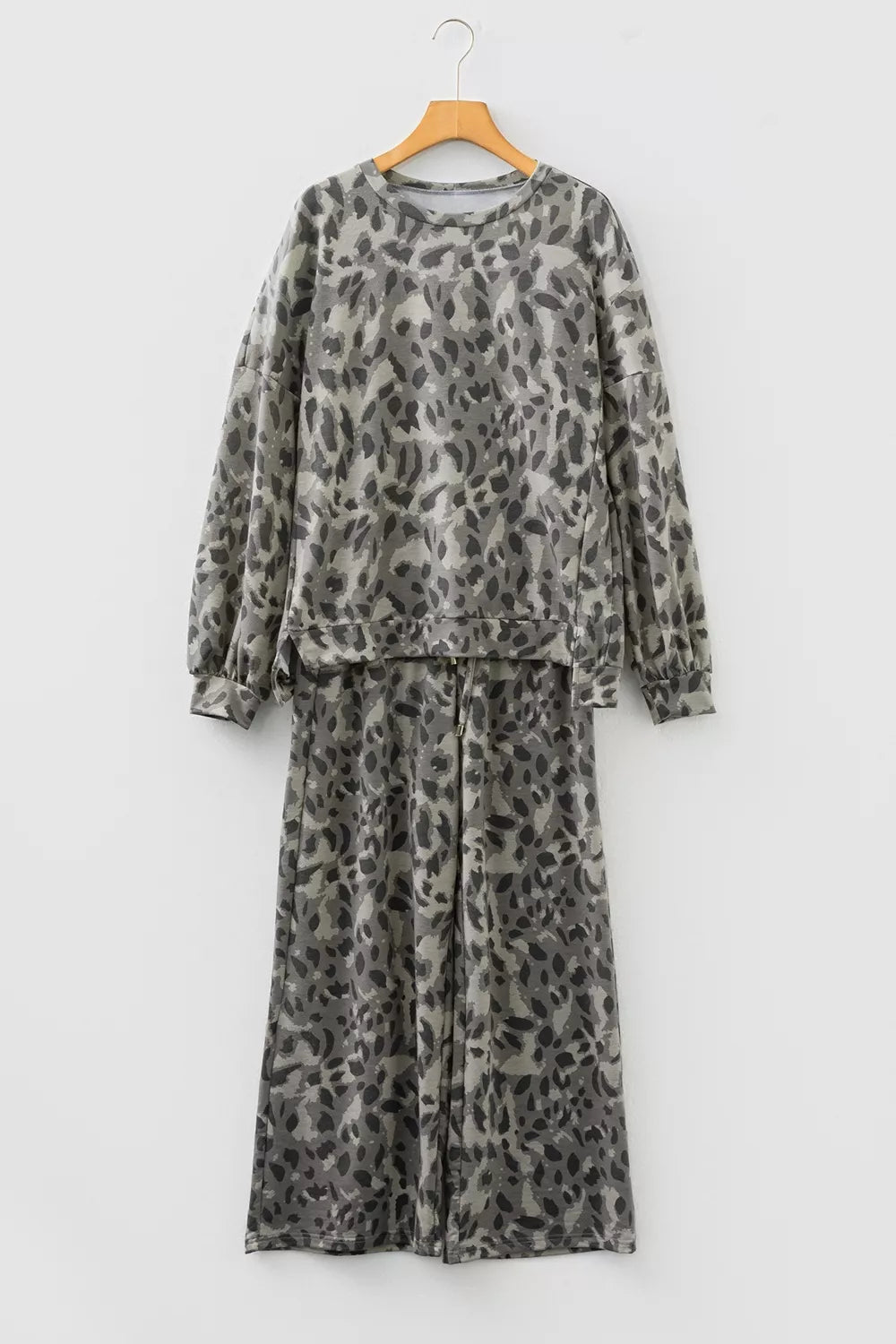 95% polyester, 5% elastane Care instructions: Machine wash cold pajama set in dark brown with relaxed silhouette