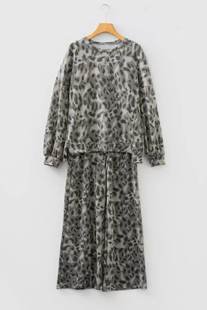 95% polyester, 5% elastane Care instructions: Machine wash cold pajama set in dark brown with relaxed silhouette