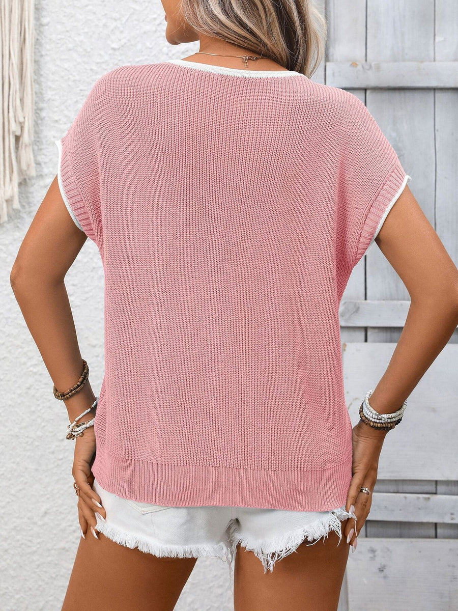 Pink ribbed knit short-sleeve top with white trim and a relaxed fit.
