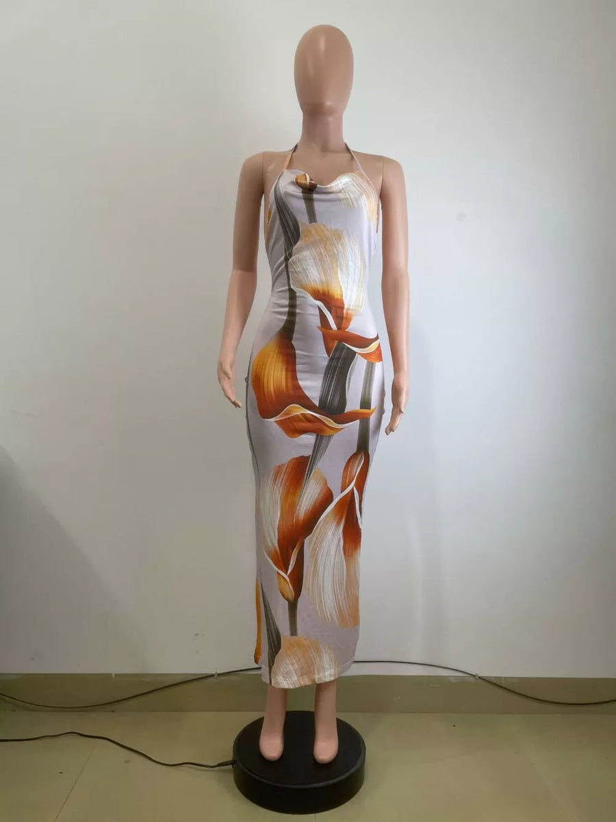 Maxi dress with cowl neck, floral print, and body-skimming fit.