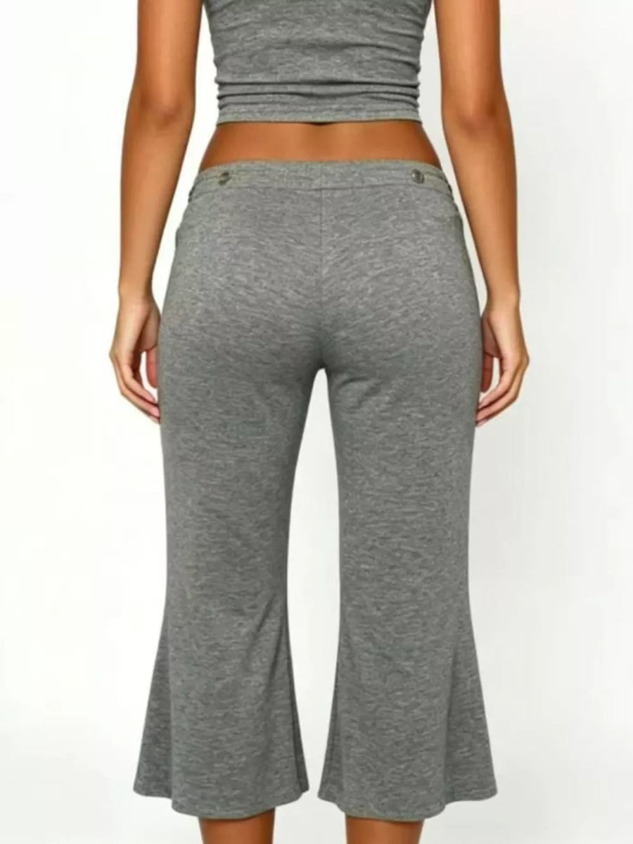 Light gray maternity capri pants with flared hem and button detail