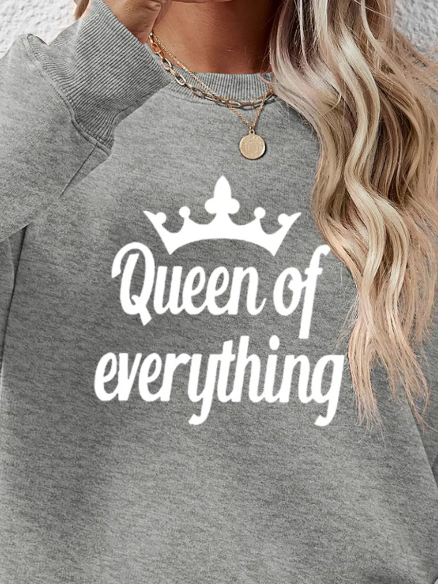 Queen of Everything graphic sweatshirt in grey with white text and crown detail.