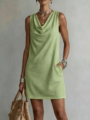 Sleeveless light green cowl neck mini dress with pockets
