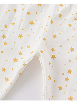 White leggings with gold star print