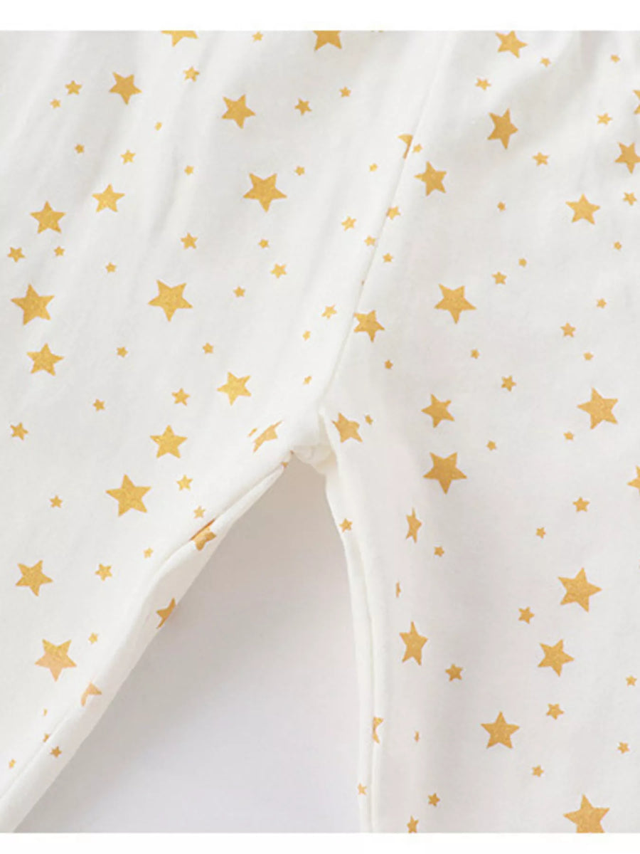 White leggings with gold star print