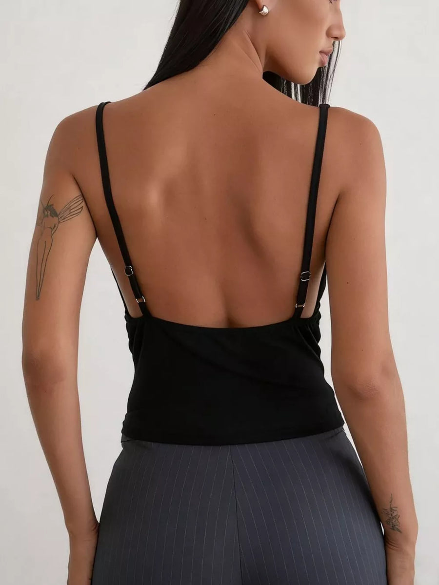 Black sequin ruched cowl neck tank top with spaghetti straps and a low back.