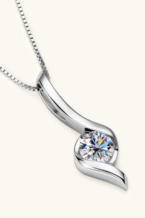 Silver moissanite pendant necklace with a sculpted setting and box chain.