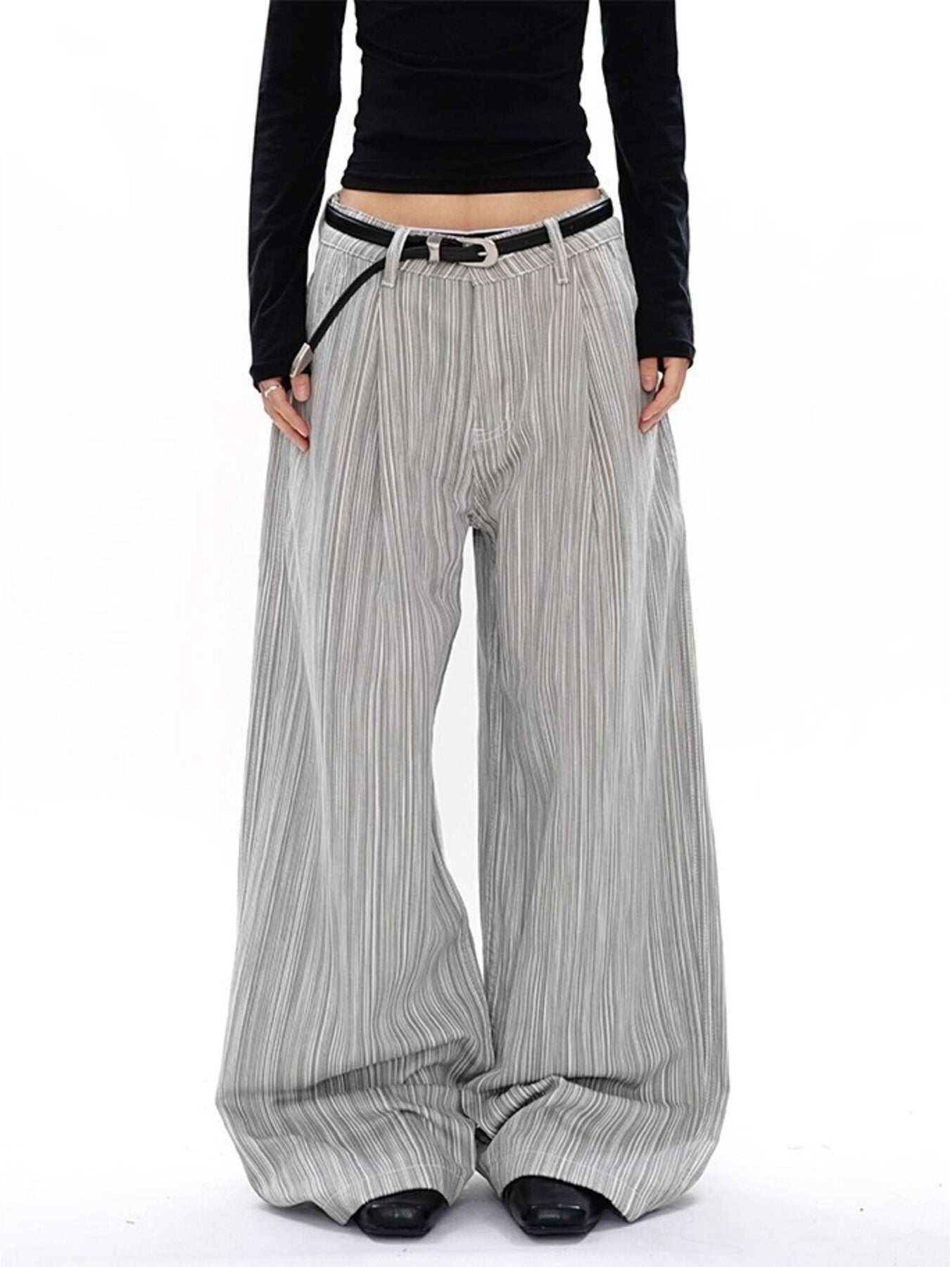 Men's grey striped wide-leg sweatpants with a pleated texture and black belt.