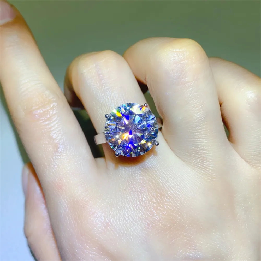 Radiant Moissanite Solitaire Ring in silver, featuring a large, brilliant-cut stone on a sterling silver band.
