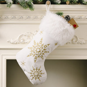 White Christmas stocking with gold embroidered snowflakes and faux fur trim