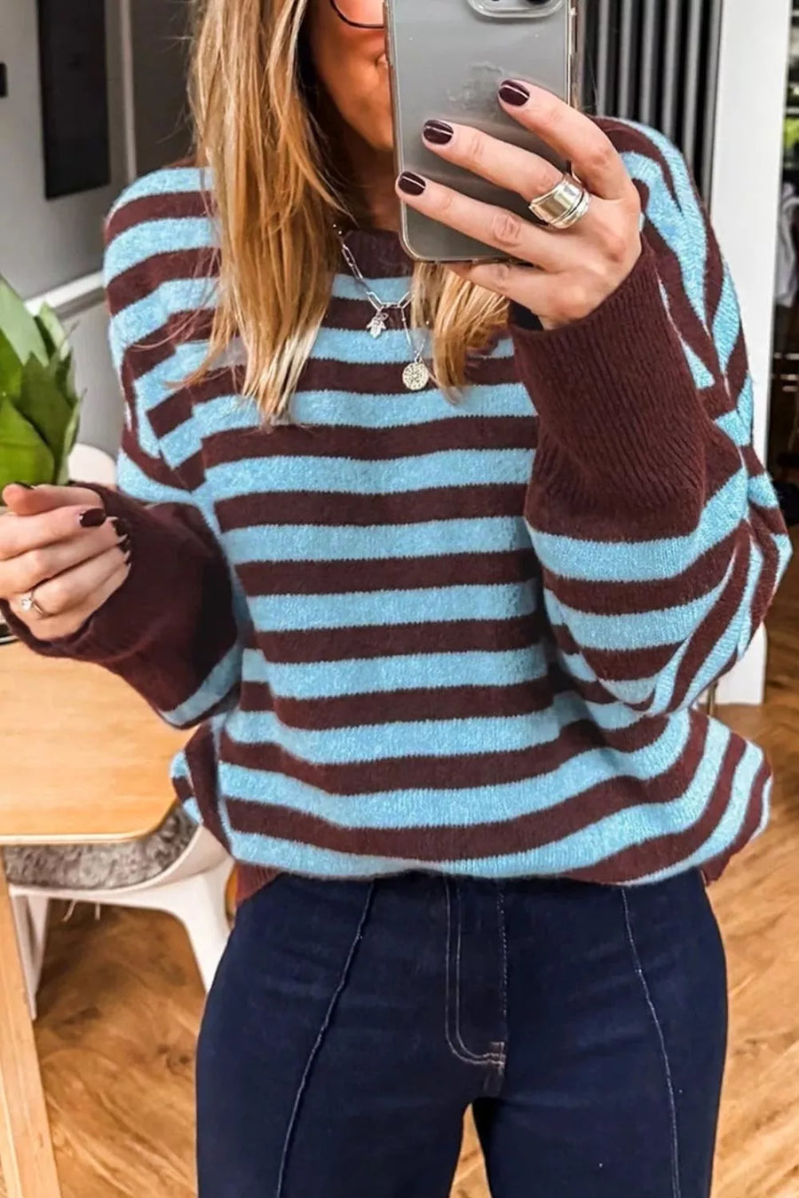 52% viscose, 26% polyester, 22% polyamide Care instructions: Machine wash cold pullover sweater in Dusty Blue with relaxed