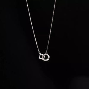 necklace in clear with geometric and zircon embellishment