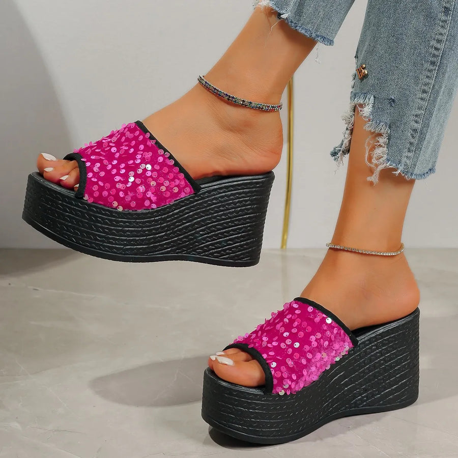 Hot Pink sequin platform wedge slides with black wedge sole and trim.