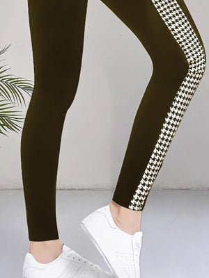 leggings featuring houndstooth in Black with 95% polyester, 5% spandex Care instructions: Machine wash cold texture