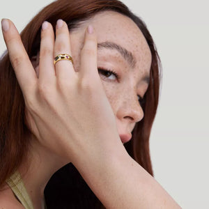 lime green ring with zircon embellishment and null