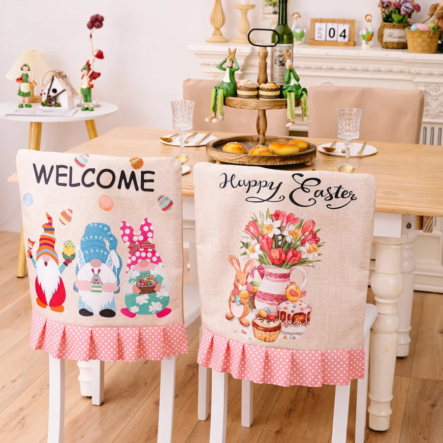 Easter gnome & bunny chair covers with pink polka dot trim, one says Welcome, the other Happy Easter.