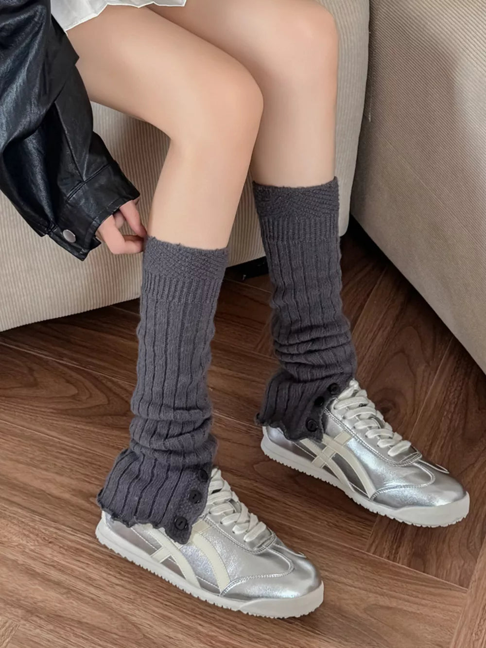 leg warmers in charcoal featuring ribbed knit and slouchy fit