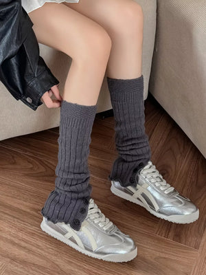 leg warmers in charcoal featuring ribbed knit and slouchy fit