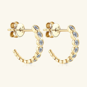 Gold moissanite pavé hoop earrings with bezel-set stones