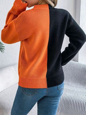 pullover sweater in orange with graphic and stretch