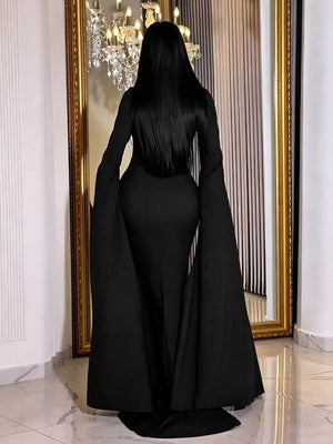 Black maxi dress featuring rhinestone and geometric