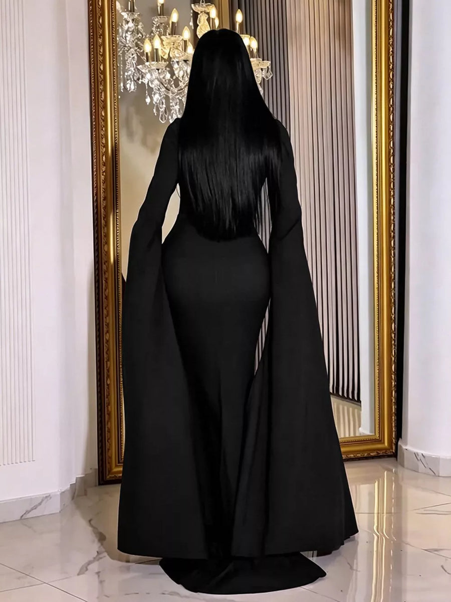 Black maxi dress featuring rhinestone and geometric