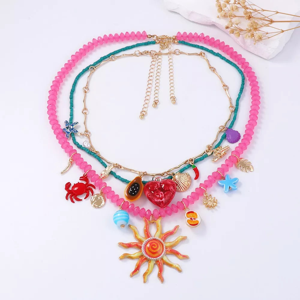 necklace in hot pink featuring 3-piece set and layered fit