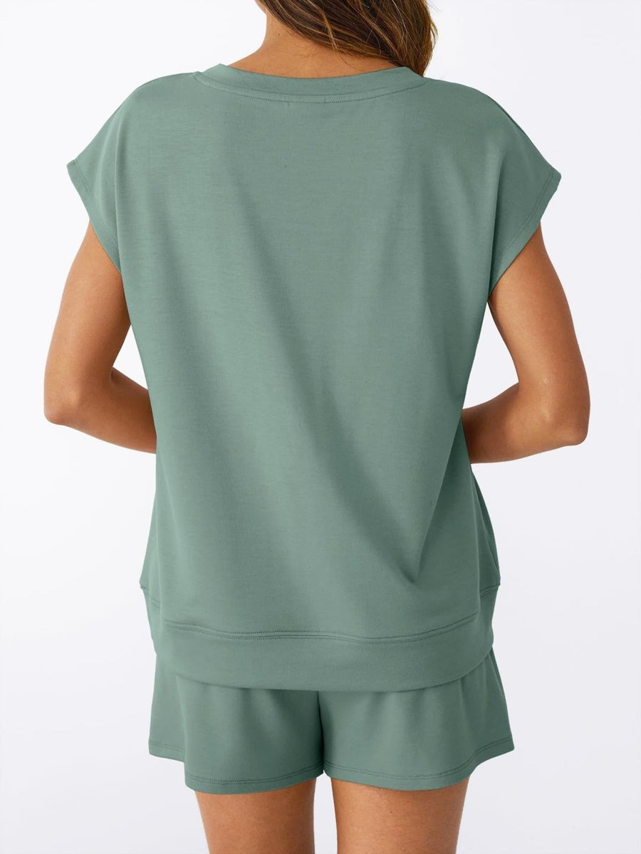 Light green V-neck top with cap sleeves and drawstring shorts set