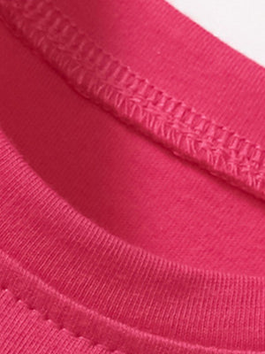Toddler cotton dress in pink with double-stitched seams.