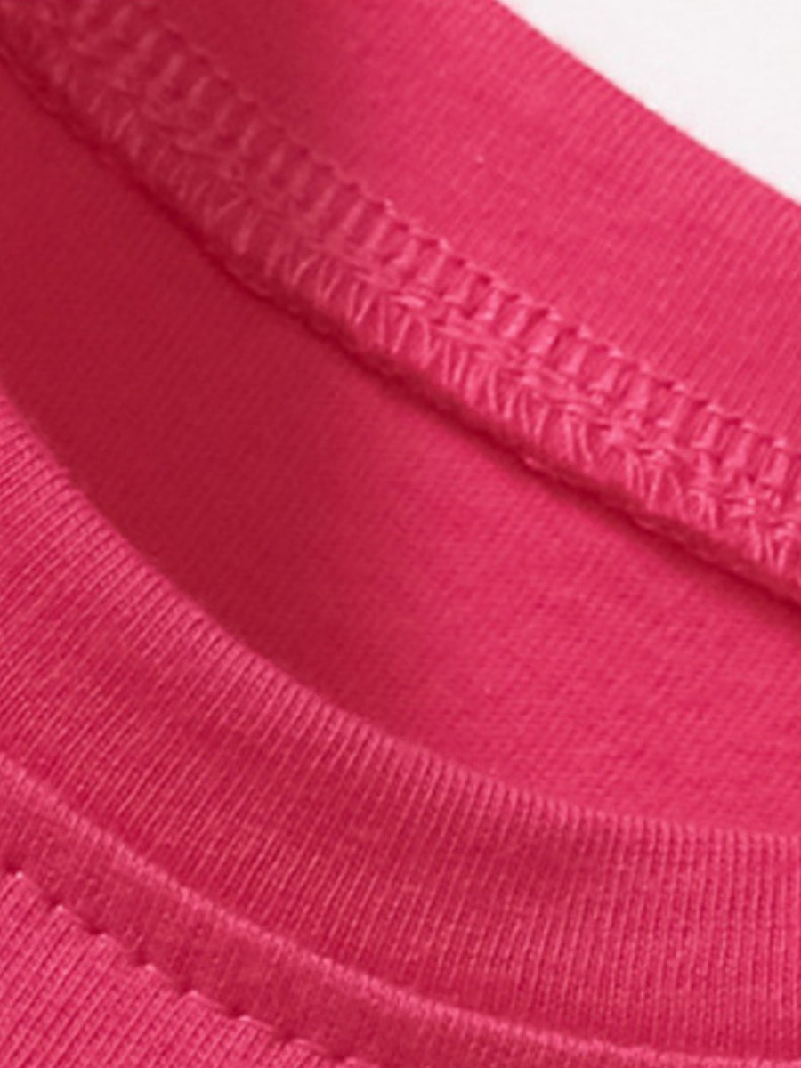 Toddler cotton dress in pink with double-stitched seams.