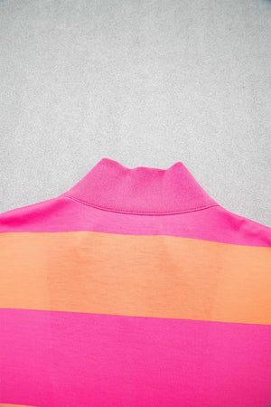 Two-piece set with vibrant pink and orange stripes and a ribbed mock neck collar.