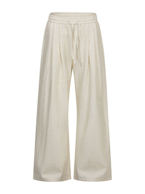 wide-leg pants in cream featuring drawstring waist and wide-leg fit