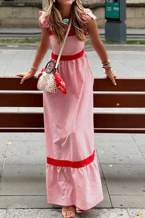 Maxi dress with red and white stripes, bow knot straps, and red trim.