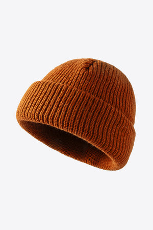 Folded edge ribbed knit beanie in brown acrylic with a casual fit.