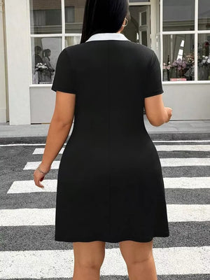 Black plus-size bodycon mini dress with short sleeves and a white contrast collar.