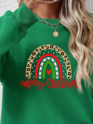 Green Christmas sweatshirt with rainbow graphic and Merry Christmas text.