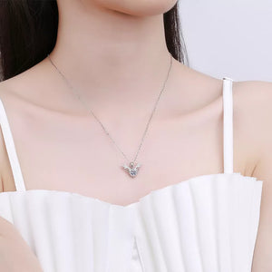 Sterling silver necklace with antler-inspired moissanite charm.